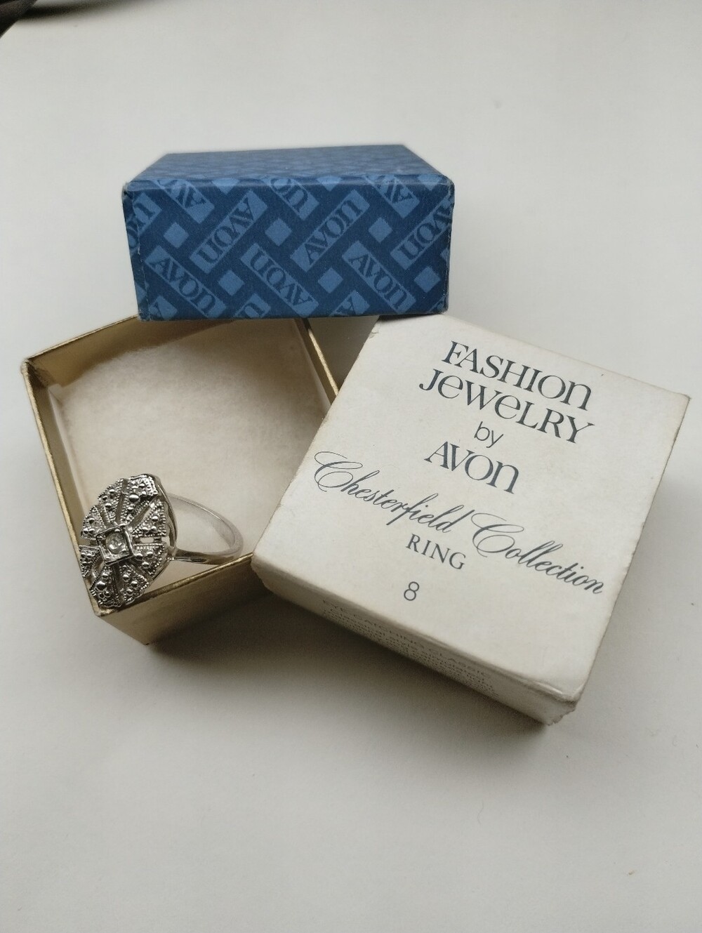 Avon Silver-Tone Ring with Blue Center and Sparkling Accents